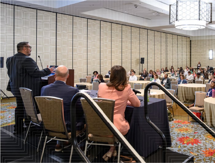 A speaker leads a session at the American Hospital Association's Healthier Together Conference, taking place May 4-6, 2027 in Anaheim